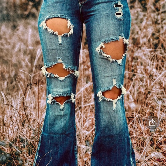 High Rise Distressed Flared Jeans - Picture 2 of 6